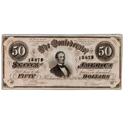 Front side of an 1864 CSA fifty-dollar bill number 15879 featuring a central portrait of Jefferson Davis, showing two minor edge tears in EF/AU condition.