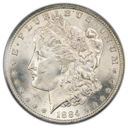 Front view of an 1884-O Morgan Silver Dollar graded PCGS MS-63 showing strong mint luster and Lady Liberty's profile