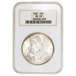 NGC certified slab showing the obverse of an 1887 Morgan Silver Dollar graded MS 63, featuring Liberty wearing a Phrygian cap.