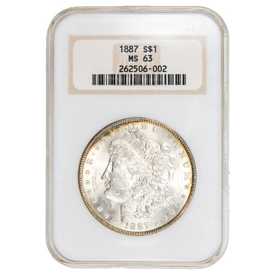 NGC certified slab showing the obverse of an 1887 Morgan Silver Dollar graded MS 63, featuring Liberty wearing a Phrygian cap.