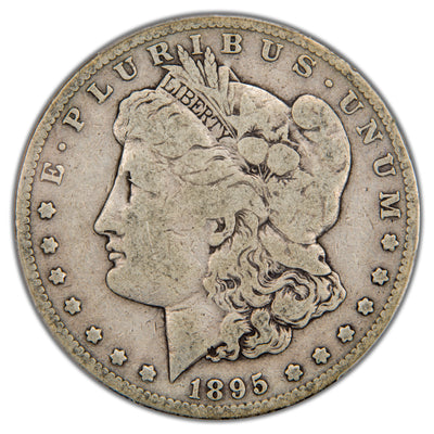 Front side of an 1895-S Morgan Silver Dollar coin showing the profile of Lady Liberty with visible wear consistent with Very Good 10 grade.