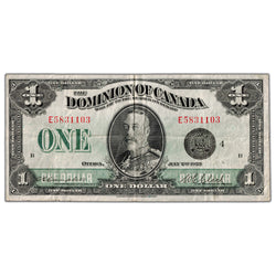 Front side of 1923 Canadian one-dollar bill number 5831103, showing King George V portrait and Black Seal Series E in Fine/Very Fine condition.