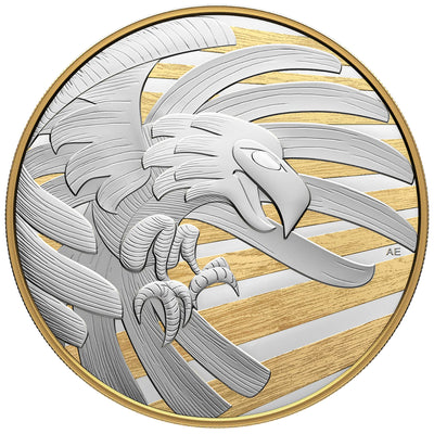 The reverse side of the 2023 Canadian 250-dollar fine silver kilo coin, featuring an original design by Tahltan artist Alano Edzerza. Rendered in the traditional style of Tahltan sculptural art, it depicts Raven in a matte-frosted sky after stealing light, illuminated by vibrant, selective yellow gold-plated sunrays spreading across the 102 mm proof surface.