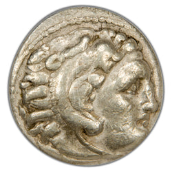 Close-up view of the obverse depicting Herakles wearing the Nemean lion skin profile on Alexander the Great AR Drachm, ICG certification 4418250111.
