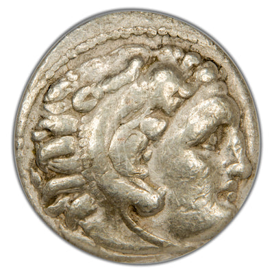 Close-up view of the obverse depicting Herakles wearing the Nemean lion skin profile on Alexander the Great AR Drachm, ICG certification 4418250111.