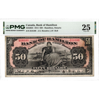 Front face view of a 1914 Bank of Hamilton 50 dollar chartered banknote, highlighting the classic bank layout and PMG VF-25 grading details.