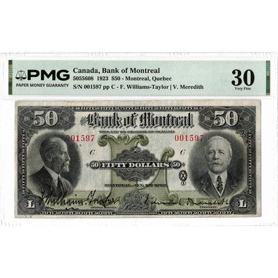Front face view of a 1923 Bank of Montreal 50 dollar chartered banknote, highlighting the historical design vignettes and PMG VF-30 grading details.