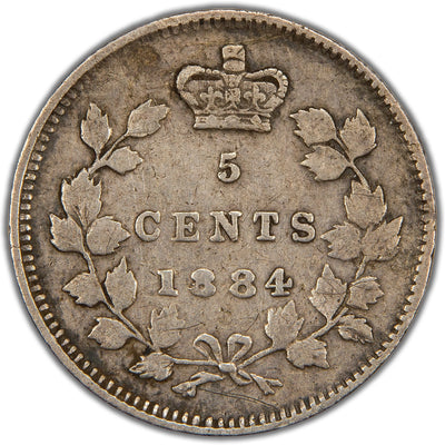 Reverse of a Canada 1884 5 Cents silver coin (SKU: SP2843) in Fine condition with scratched surfaces, displaying the denomination 5 CENTS and date 1884 crowned at the top within a tied maple leaf wreath.