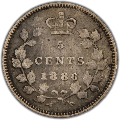 Reverse of a key-variety Canada 1886 5 Cents silver coin (Small 6 variety, SKU: SP2845) in Fine condition, displaying the denomination 5 CENTS and date 1886 featuring the distinct Small 6 numeral crowned at the top, enclosed within a tied maple leaf wreath.
