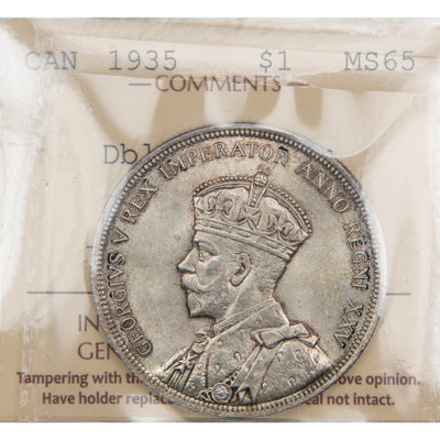Front of ICCS protective slab encapsulation holder for a Canada 1935 Double Voyager $1 Silver Dollar coin (Grade MS-65, SKU: XZV 733), displaying the official ICCS yellow certification insert label with grade, variety designation, and serial number above the coin.