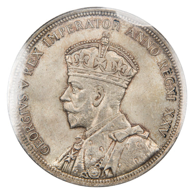 Obverse of a Canada 1935 Double Voyager $1 Silver Dollar coin (ICCS MS-65, SKU: XZV 733), featuring the crowned profile portrait of King George V wearing coronation robes facing left, surrounded by GEORGIUS V REX IMPERATOR ANNO REGNI XXV.