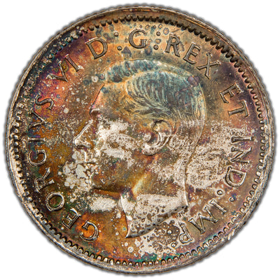 Obverse of a Canada 1940 10 Cents silver coin (SKU: SP2850) in Uncirculated condition with gorgeous colorful toning, featuring the crisp uncrowned head portrait of King George VI facing left, surrounded by the Latin legend GEORGIVS VI D:G:BRITT:OMN:REX.