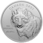 Engraved rendering of a lone wolf looking forward on the reverse of a 2021 Royal Canadian Mint $100 10 oz fine silver coin, designed by wildlife artist Robert Bateman.
