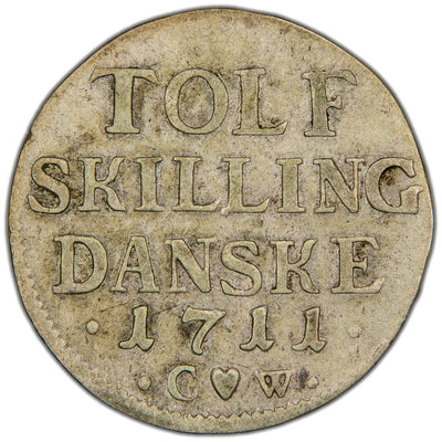 Reverse of a Denmark (Copenhagen mint) 1711 12 Skilling Danske silver coin (H-43A, SKU: SP2803), displaying the four-line inscription "TOLF SKILLING DANSKE", date 1711, and heart mintmark flanked by C W initials below.