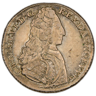 Obverse of a Denmark (Copenhagen mint) 1731 24 Skilling Dansk silver coin of King Christian VI (SKU: SP2819), featuring the right-facing armored bust of King Christian VI wearing a full peruke wig and the Order of the Elephant necklace, surrounded by the outer Latin legend.