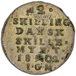 Reverse of a Denmark/Norway (Kongsberg mint) 1802 2 Skilling silver coin (H-18A, SKU: SP2809), displaying the denomination value 2 SKILLING DANSKE flanked by the date 1802 with crossed hammers mintmark below within a beaded ring.
