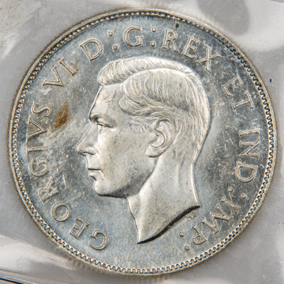 Front view of 1946 Canada 50 Cents silver coin featuring the uncrowned portrait bust of King George VI in an ICCS MS-64 holder.