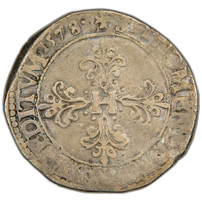 Reverse of a France 1578 1 Franc silver coin (SKU: SP2826), displaying a ornate foliated cross fleury with an H monogram at its center, flanked by four fleurs-de-lis in the angles, surrounded by the Latin legend SIT · NOMEN · DOMINI · BENEDICTVM.