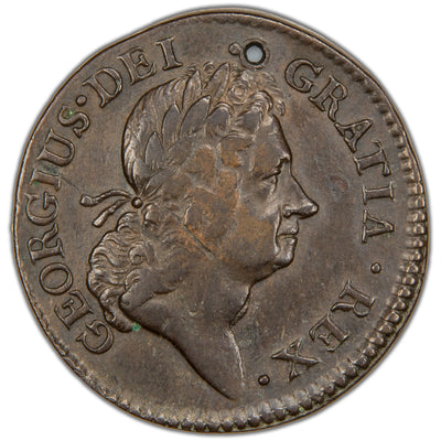 Obverse of a holed Ireland 1723 Wood's Hibernia 1/2d Half Penny copper coin (SKU: SP2885), featuring the laureate profile bust of King George I facing right, surrounded by the legend GEORGIUS . D : G : REX ., with a hole pierced through the flan.