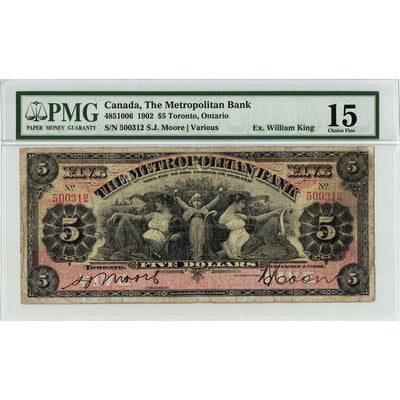 Front face view of a 1902 The Metropolitan Bank 5 dollar chartered banknote, highlighting the historical design vignettes and PMG F-15 grading details.