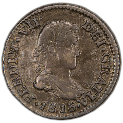 Obverse of a Spanish Colonial Mexico 1815 1/2 Real silver coin (Mexico City mint, assayer JJ, SKU: SP2899), featuring the draped military bust portrait of King Ferdinand VII of Spain facing right, surrounded by the Latin legend FERDINANDUS VII DEI GRATIA and date 1815.