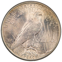 Reverse of a United States 1924 $1 Peace silver dollar coin (Philadelphia Mint, SKU: SP2876), depicting an American Bald Eagle perched on a rock cliff holding an olive branch against rays of sunlight, with the word PEACE at the base.