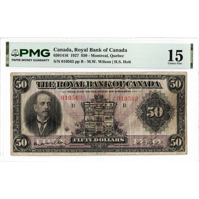 Front face view of a 1927 Royal Bank of Canada 50 dollar chartered banknote, highlighting the historical design vignettes and PMG F-15 grading details.