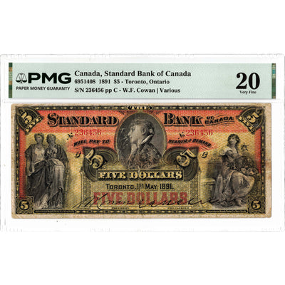 Front face view of an 1891 Standard Bank of Canada 5 dollar chartered banknote, highlighting the historical design vignettes and PMG VF-20 grading details.