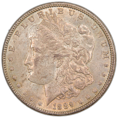 Obverse of a United States 1889 $1 Morgan silver dollar coin (Philadelphia Mint, SKU: SP2879), featuring the left-facing profile bust of Lady Liberty wearing a Phrygian cap decorated with flora and a tiara inscribed LIBERTY, surrounded by 13 stars and the date 1889.