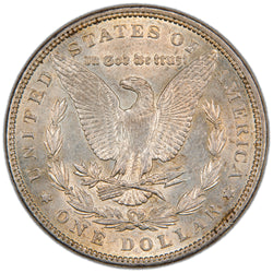 Reverse of a United States 1889 $1 Morgan silver dollar coin (Philadelphia Mint, SKU: SP2879), depicting an American Bald Eagle with wings spread, holding arrows and an olive branch within a laurel wreath, with the motto IN GOD WE TRUST above.