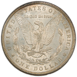 Reverse of a United States 1897 $1 Morgan silver dollar coin (Philadelphia Mint, SKU: SP2878), depicting an American Bald Eagle with wings spread, holding arrows and an olive branch within a laurel wreath, with the motto IN GOD WE TRUST above.