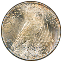 Reverse of a United States 1925 $1 Peace silver dollar coin (Philadelphia Mint, SKU: SP2875), depicting an American Bald Eagle perched on a rock cliff holding an olive branch against rays of sunlight, with the word PEACE at the base.