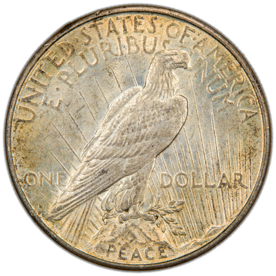 Reverse of a United States 1934-D $1 Peace silver dollar coin (Denver Mint, SKU: SP2873), depicting an American Bald Eagle perched on a rock holding an olive branch with rays of sun, featuring the 'D' mint mark along the lower left edge.